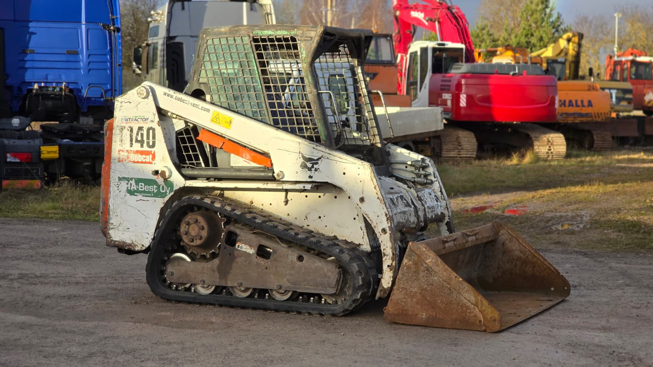 BOBCAT T140 - Kompaktni utovarivač gusjeničar: slika BOBCAT T140 - Kompaktni utovarivač gusjeničar BOBCAT T140 - Kompaktni utovarivač gusjeničar: slika BOBCAT T140 - Kompaktni utovarivač gusjeničar