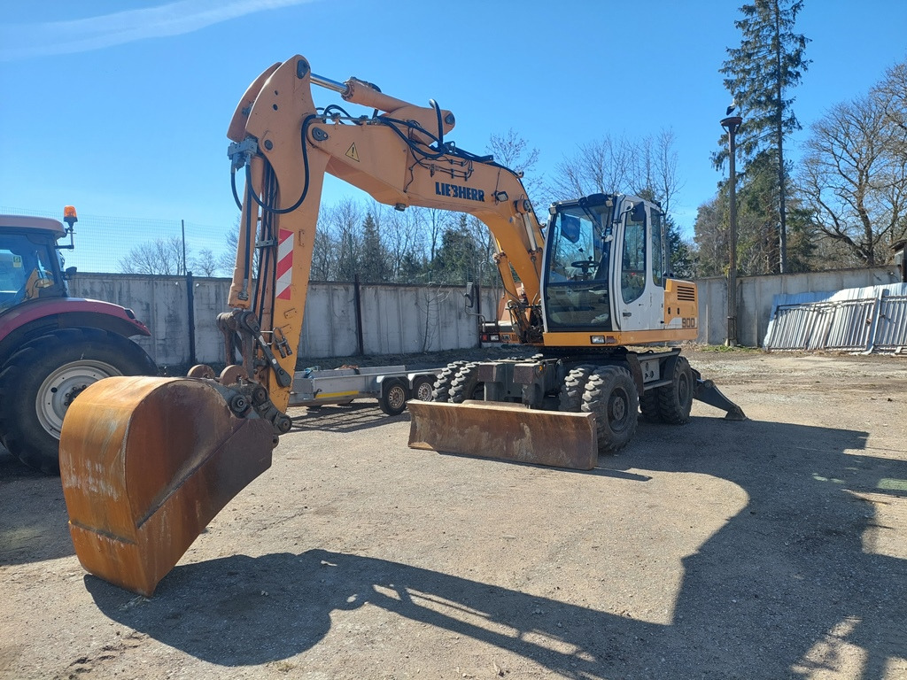 LIEBHERR A900C - Bager na kotačima: slika LIEBHERR A900C - Bager na kotačima LIEBHERR A900C - Bager na kotačima: slika LIEBHERR A900C - Bager na kotačima