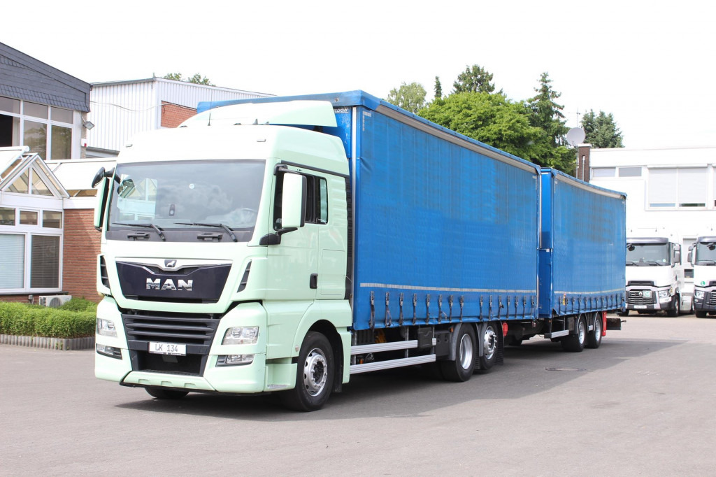 MAN TGX 26.460 Retarder Jumbo-Zug 120M3 Durchlade - Kamion s ceradom: slika MAN TGX 26.460 Retarder Jumbo-Zug 120M3 Durchlade - Kamion s ceradom MAN TGX 26.460 Retarder Jumbo-Zug 120M3 Durchlade - Kamion s ceradom: slika MAN TGX 26.460 Retarder Jumbo-Zug 120M3 Durchlade - Kamion s ceradom