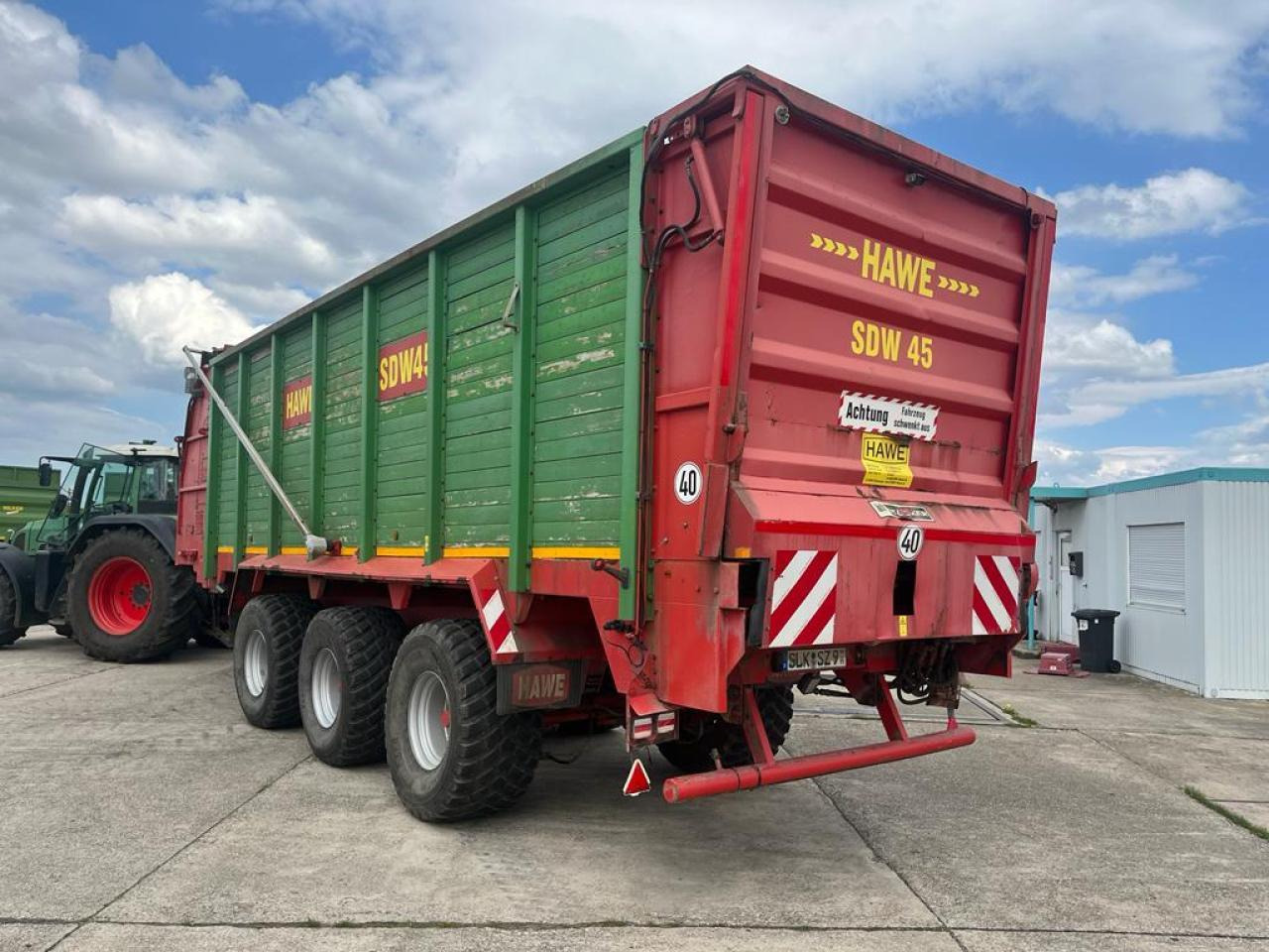 HAWE Tridem SDW 45T, Silagewagen, Baujahr 2011 - Nagibna prikolica za poljoprivredna gospodarstva/ Istovarivač: slika HAWE Tridem SDW 45T, Silagewagen, Baujahr 2011 - Nagibna prikolica za poljoprivredna gospodarstva/ Istovarivač HAWE Tridem SDW 45T, Silagewagen, Baujahr 2011 - Nagibna prikolica za poljoprivredna gospodarstva/ Istovarivač: slika HAWE Tridem SDW 45T, Silagewagen, Baujahr 2011 - Nagibna prikolica za poljoprivredna gospodarstva/ Istovarivač