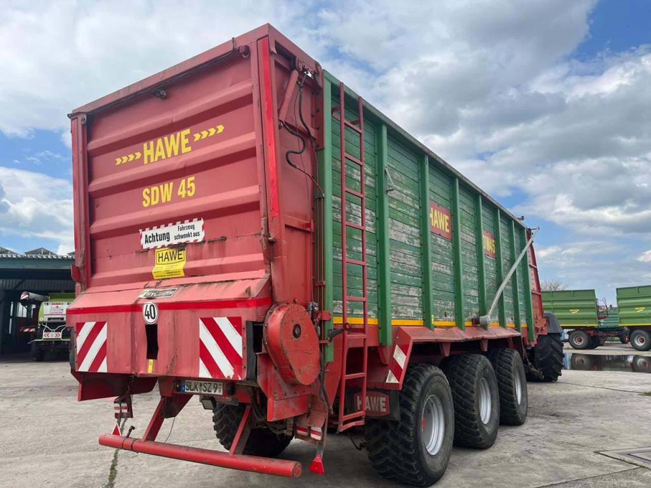 HAWE Tridem SDW 45T, Silagewagen - Nagibna prikolica za poljoprivredna gospodarstva/ Istovarivač: slika HAWE Tridem SDW 45T, Silagewagen - Nagibna prikolica za poljoprivredna gospodarstva/ Istovarivač HAWE Tridem SDW 45T, Silagewagen - Nagibna prikolica za poljoprivredna gospodarstva/ Istovarivač: slika HAWE Tridem SDW 45T, Silagewagen - Nagibna prikolica za poljoprivredna gospodarstva/ Istovarivač