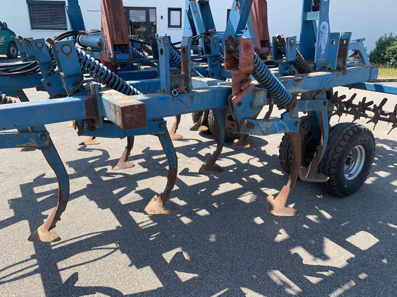 Rabe Grubber mit Spatenrollegge, 4-balkig - Kultivator: slika Rabe Grubber mit Spatenrollegge, 4-balkig - Kultivator Rabe Grubber mit Spatenrollegge, 4-balkig - Kultivator: slika Rabe Grubber mit Spatenrollegge, 4-balkig - Kultivator