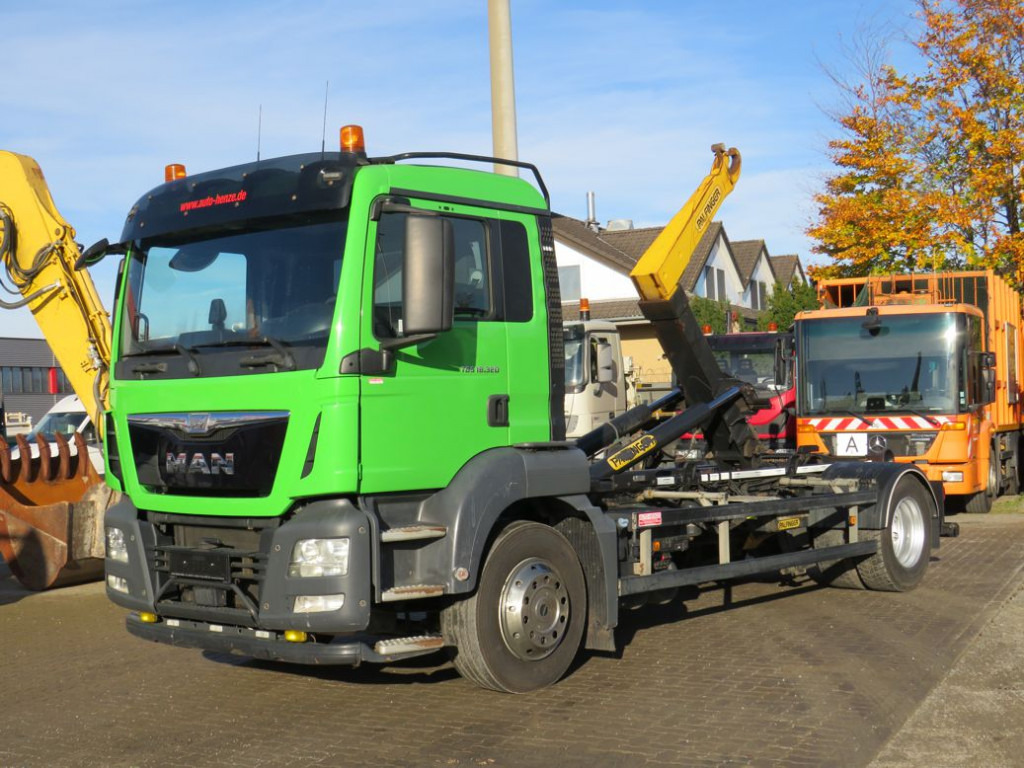 MAN TG-S 18.320 BL Abrollkipper - Kamion s kukastom dizalicom: slika MAN TG-S 18.320 BL Abrollkipper - Kamion s kukastom dizalicom MAN TG-S 18.320 BL Abrollkipper - Kamion s kukastom dizalicom: slika MAN TG-S 18.320 BL Abrollkipper - Kamion s kukastom dizalicom