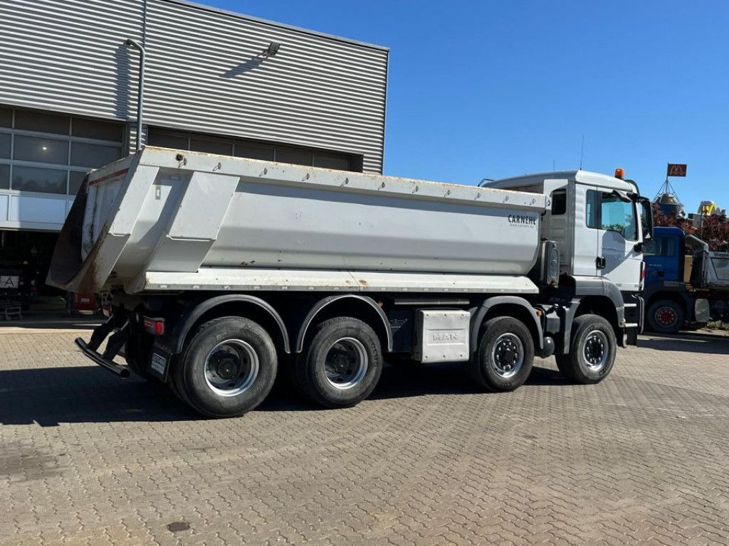 MAN TG-S 35.400 8x6H 4 Achs Muldenkipper Carnehl - Utovarivač s proklizavajućim upravljanjem: slika MAN TG-S 35.400 8x6H 4 Achs Muldenkipper Carnehl - Utovarivač s proklizavajućim upravljanjem MAN TG-S 35.400 8x6H 4 Achs Muldenkipper Carnehl - Utovarivač s proklizavajućim upravljanjem: slika MAN TG-S 35.400 8x6H 4 Achs Muldenkipper Carnehl - Utovarivač s proklizavajućim upravljanjem