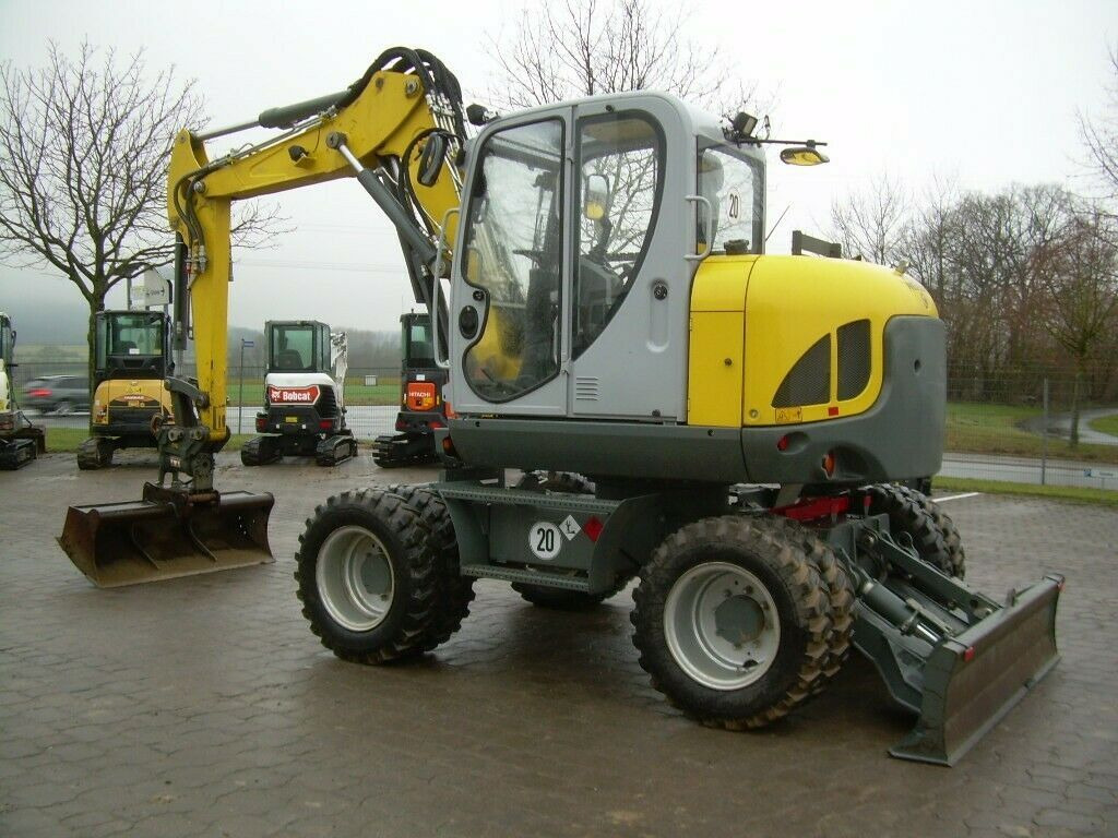 Wacker EW 100, Bj 20, 1750 BH, VA, Powertilt HS08, GL - Bager na kotačima: slika Wacker EW 100, Bj 20, 1750 BH, VA, Powertilt HS08, GL - Bager na kotačima Wacker EW 100, Bj 20, 1750 BH, VA, Powertilt HS08, GL - Bager na kotačima: slika Wacker EW 100, Bj 20, 1750 BH, VA, Powertilt HS08, GL - Bager na kotačima