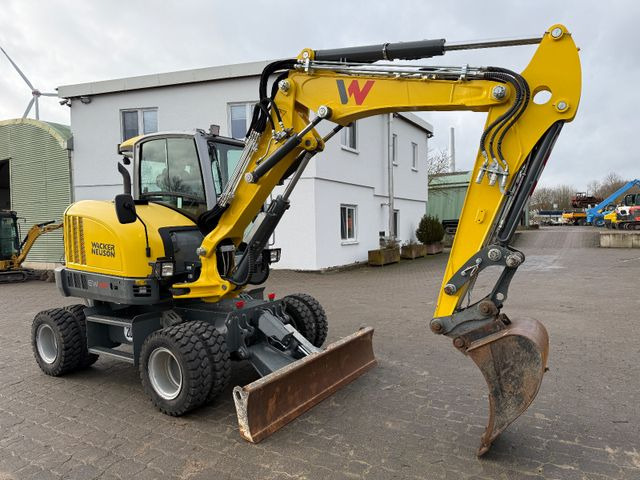 Wacker EW 65, Bj 23, 1200 BH, hydr. VA, Klima, wie neu - Bager na kotačima: slika Wacker EW 65, Bj 23, 1200 BH, hydr. VA, Klima, wie neu - Bager na kotačima Wacker EW 65, Bj 23, 1200 BH, hydr. VA, Klima, wie neu - Bager na kotačima: slika Wacker EW 65, Bj 23, 1200 BH, hydr. VA, Klima, wie neu - Bager na kotačima