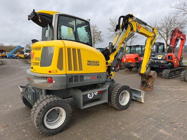 Wacker EW 65, Bj 23, 1200 BH, hydr. VA, Klima, wie neu - Bager na kotačima: slika Wacker EW 65, Bj 23, 1200 BH, hydr. VA, Klima, wie neu - Bager na kotačima Wacker EW 65, Bj 23, 1200 BH, hydr. VA, Klima, wie neu - Bager na kotačima: slika Wacker EW 65, Bj 23, 1200 BH, hydr. VA, Klima, wie neu - Bager na kotačima