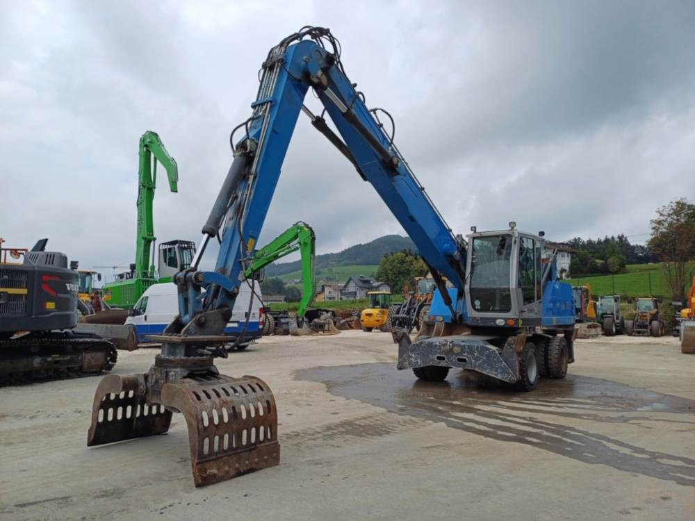 Fuchs MHL 331 - Stroj za rukovanje otpadom: slika Fuchs MHL 331 - Stroj za rukovanje otpadom Fuchs MHL 331 - Stroj za rukovanje otpadom: slika Fuchs MHL 331 - Stroj za rukovanje otpadom