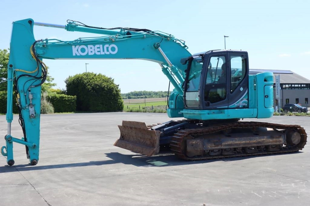Kobelco SK 230 SR LC - Bager gusjeničar: slika Kobelco SK 230 SR LC - Bager gusjeničar Kobelco SK 230 SR LC - Bager gusjeničar: slika Kobelco SK 230 SR LC - Bager gusjeničar