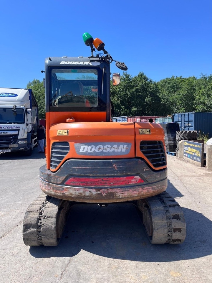 Doosan DX 63-3 - Mini bager: slika Doosan DX 63-3 - Mini bager Doosan DX 63-3 - Mini bager: slika Doosan DX 63-3 - Mini bager
