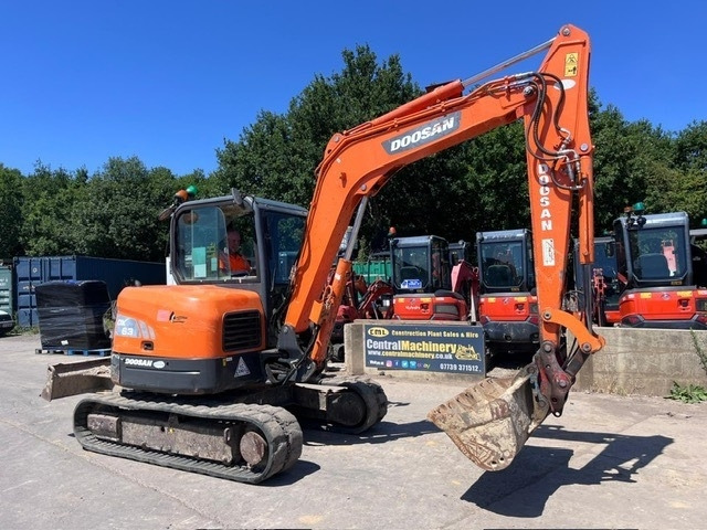 Doosan DX 63-3 - Mini bager: slika Doosan DX 63-3 - Mini bager Doosan DX 63-3 - Mini bager: slika Doosan DX 63-3 - Mini bager