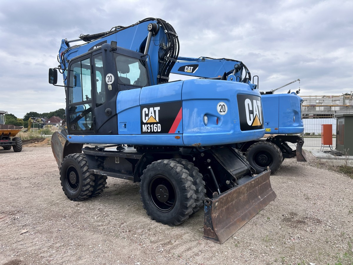 CATERPILLAR M 316 D Oil Quick OQ 65 Deutsche Maschine Top ! - Bager na kotačima: slika CATERPILLAR M 316 D Oil Quick OQ 65 Deutsche Maschine Top ! - Bager na kotačima CATERPILLAR M 316 D Oil Quick OQ 65 Deutsche Maschine Top ! - Bager na kotačima: slika CATERPILLAR M 316 D Oil Quick OQ 65 Deutsche Maschine Top ! - Bager na kotačima