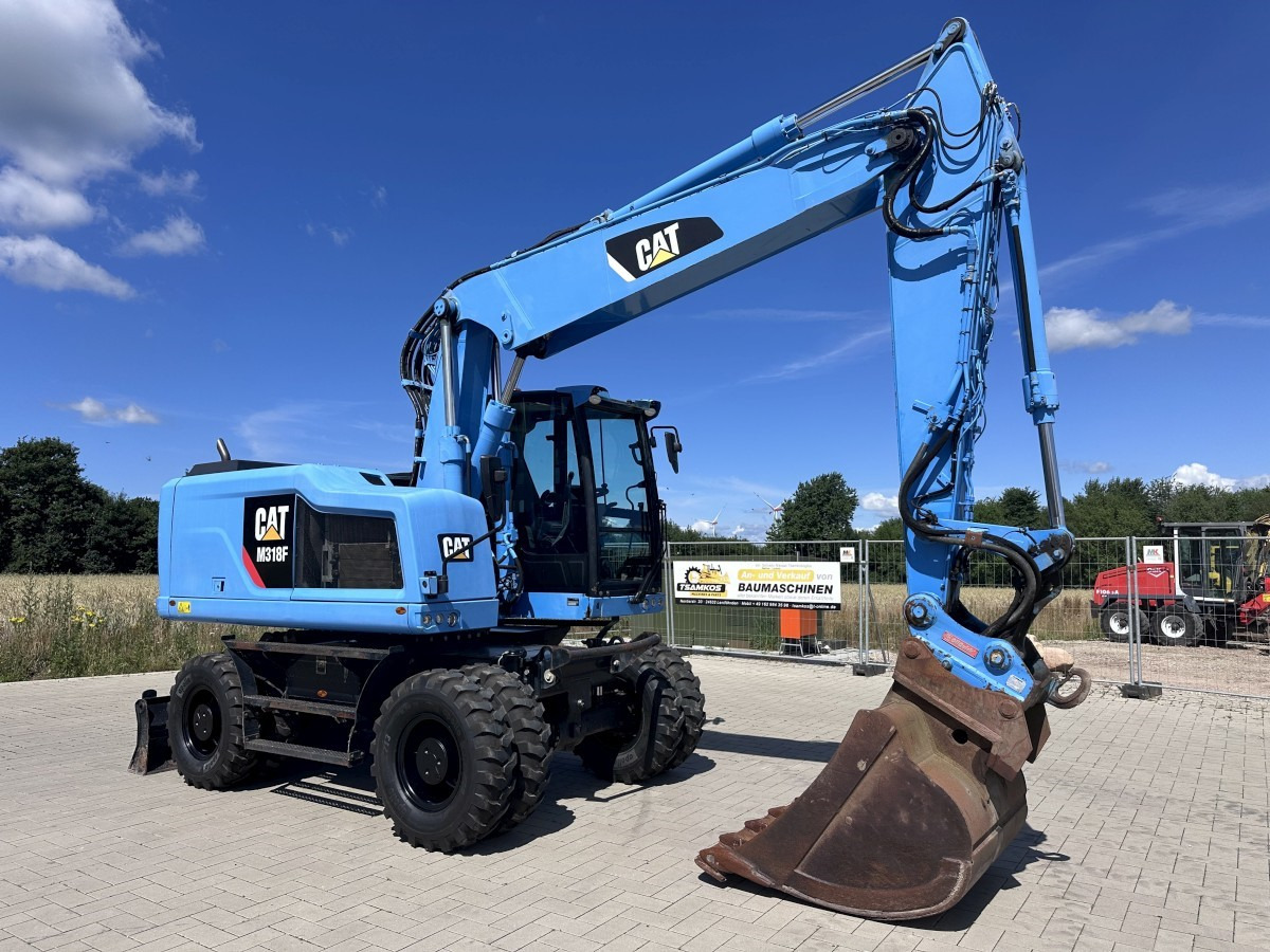 CATERPILLAR M 318 F Oil Quick OQ 65 Deutsche Maschine Top ! - Bager na kotačima: slika CATERPILLAR M 318 F Oil Quick OQ 65 Deutsche Maschine Top ! - Bager na kotačima CATERPILLAR M 318 F Oil Quick OQ 65 Deutsche Maschine Top ! - Bager na kotačima: slika CATERPILLAR M 318 F Oil Quick OQ 65 Deutsche Maschine Top ! - Bager na kotačima