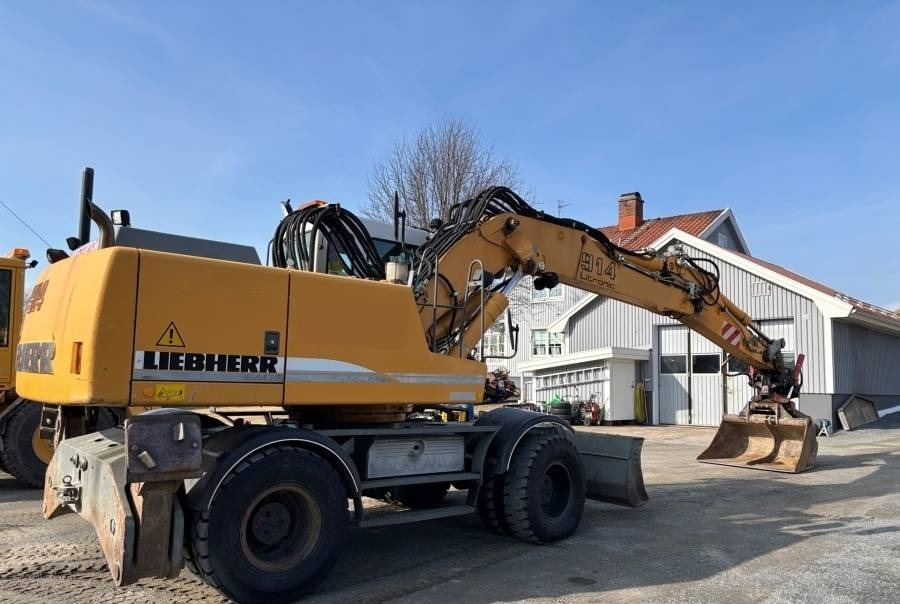Liebherr A 914 Litronic A2-PL Tiltrotator 30Km/h - Bager na kotačima: slika Liebherr A 914 Litronic A2-PL Tiltrotator 30Km/h - Bager na kotačima Liebherr A 914 Litronic A2-PL Tiltrotator 30Km/h - Bager na kotačima: slika Liebherr A 914 Litronic A2-PL Tiltrotator 30Km/h - Bager na kotačima