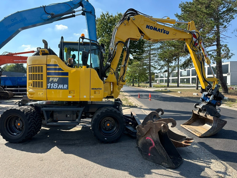 Komatsu PW 118 MR-11 14.3T - SMP ROTOTILT - *2413h* - CENTRAL GREASING - BLADE - 3 BUCKETS - TOP CONDITION - BE MACHINE - Bager na kotačima: slika Komatsu PW 118 MR-11 14.3T - SMP ROTOTILT - *2413h* - CENTRAL GREASING - BLADE - 3 BUCKETS - TOP CONDITION - BE MACHINE - Bager na kotačima Komatsu PW 118 MR-11 14.3T - SMP ROTOTILT - *2413h* - CENTRAL GREASING - BLADE - 3 BUCKETS - TOP CONDITION - BE MACHINE - Bager na kotačima: slika Komatsu PW 118 MR-11 14.3T - SMP ROTOTILT - *2413h* - CENTRAL GREASING - BLADE - 3 BUCKETS - TOP CONDITION - BE MACHINE - Bager na kotačima