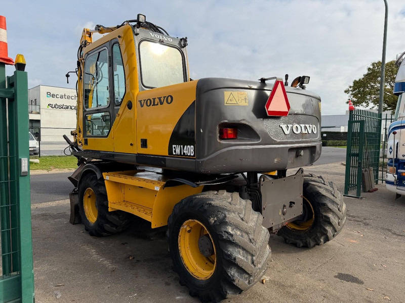 Volvo EW 140 B *FULL HYDR* - BLADE - 10.485h - TILT BUCKET - CE - NL MACHINE - GOOD CONDITION - Bager na kotačima: slika Volvo EW 140 B *FULL HYDR* - BLADE - 10.485h - TILT BUCKET - CE - NL MACHINE - GOOD CONDITION - Bager na kotačima Volvo EW 140 B *FULL HYDR* - BLADE - 10.485h - TILT BUCKET - CE - NL MACHINE - GOOD CONDITION - Bager na kotačima: slika Volvo EW 140 B *FULL HYDR* - BLADE - 10.485h - TILT BUCKET - CE - NL MACHINE - GOOD CONDITION - Bager na kotačima
