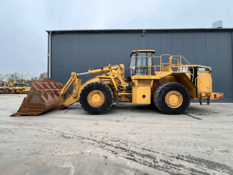 Cat 988H - Utovarivač na kotačima: slika Cat 988H - Utovarivač na kotačima Cat 988H - Utovarivač na kotačima: slika Cat 988H - Utovarivač na kotačima