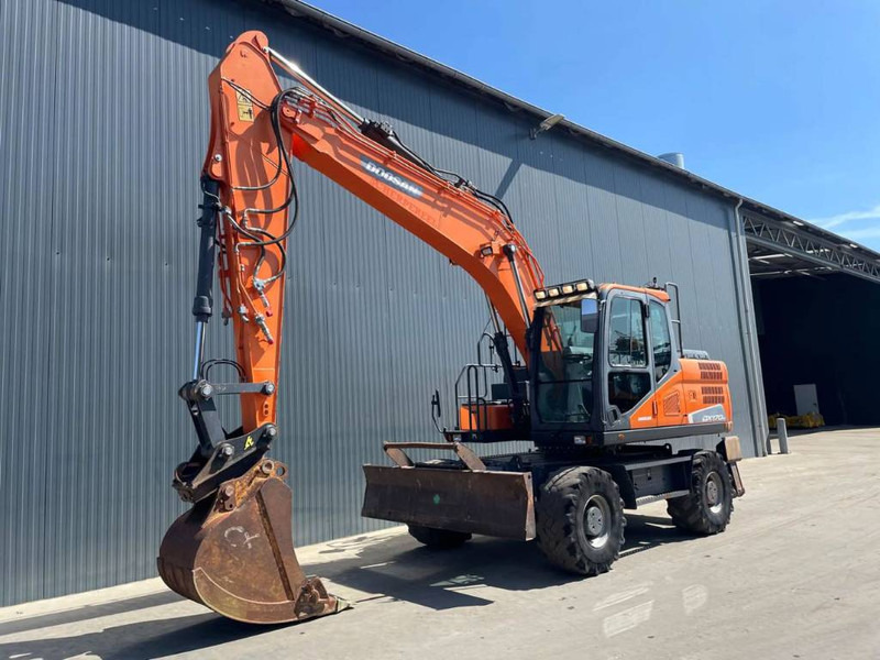 Doosan DX170W-5 - Bager na kotačima: slika Doosan DX170W-5 - Bager na kotačima Doosan DX170W-5 - Bager na kotačima: slika Doosan DX170W-5 - Bager na kotačima