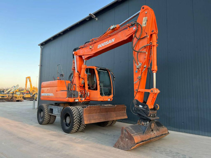Doosan DX170W - Bager na kotačima: slika Doosan DX170W - Bager na kotačima Doosan DX170W - Bager na kotačima: slika Doosan DX170W - Bager na kotačima
