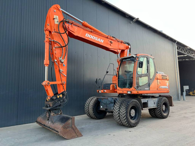 Doosan DX170W - Bager na kotačima: slika Doosan DX170W - Bager na kotačima Doosan DX170W - Bager na kotačima: slika Doosan DX170W - Bager na kotačima
