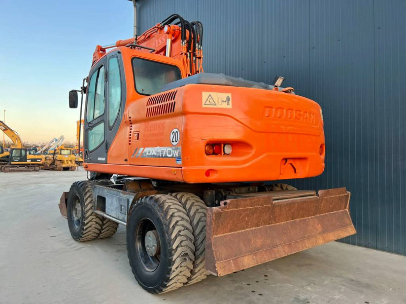 Doosan DX170W - Bager na kotačima: slika Doosan DX170W - Bager na kotačima Doosan DX170W - Bager na kotačima: slika Doosan DX170W - Bager na kotačima