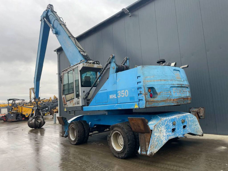 Fuchs MHL350 - Stroj za rukovanje otpadom: slika Fuchs MHL350 - Stroj za rukovanje otpadom Fuchs MHL350 - Stroj za rukovanje otpadom: slika Fuchs MHL350 - Stroj za rukovanje otpadom