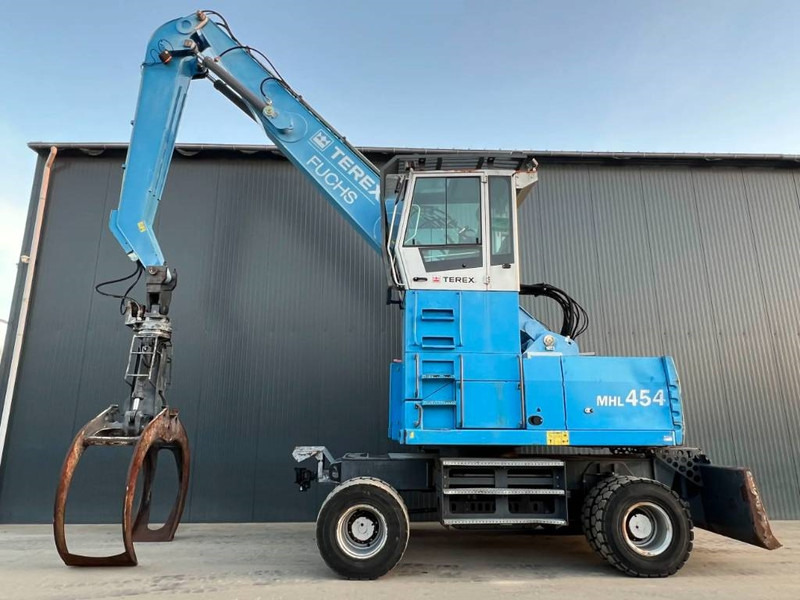 Stroj za rukovanje otpadom za prijevoz smeća Fuchs MHL454: slika Stroj za rukovanje otpadom za prijevoz smeća Fuchs MHL454