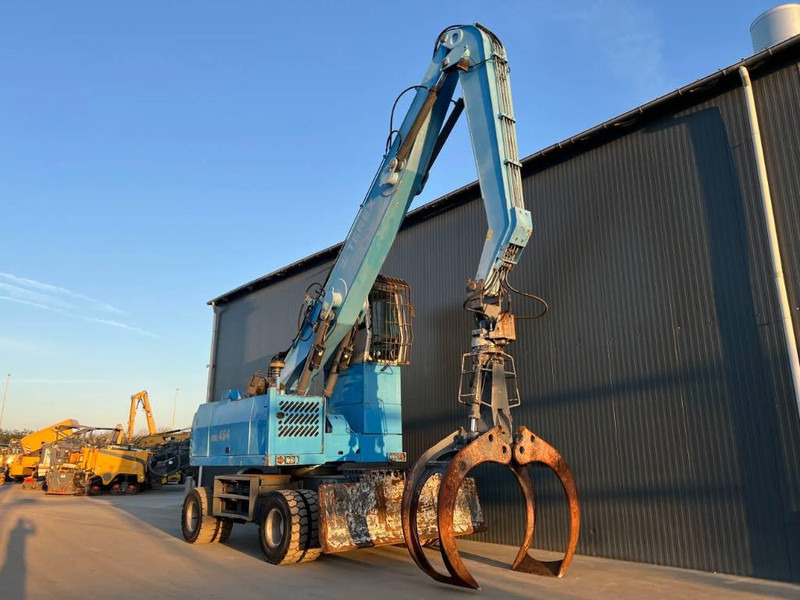 Fuchs MHL454 - Stroj za rukovanje otpadom: slika Fuchs MHL454 - Stroj za rukovanje otpadom Fuchs MHL454 - Stroj za rukovanje otpadom: slika Fuchs MHL454 - Stroj za rukovanje otpadom