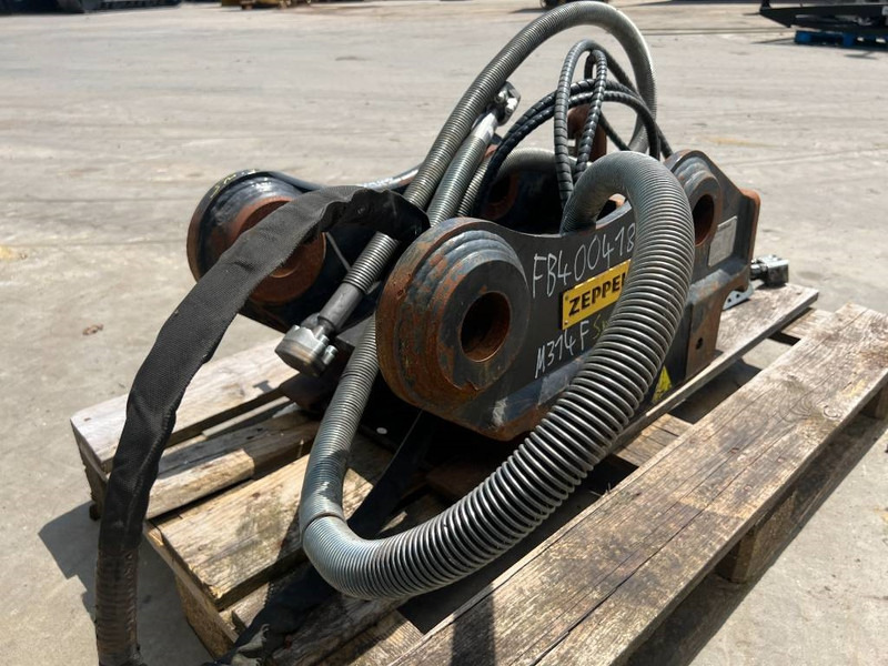 OilQuick OQ65 - M314F / M316F / M318F - Brza spojka za Građevinski strojevi: slika OilQuick OQ65 - M314F / M316F / M318F - Brza spojka za Građevinski strojevi OilQuick OQ65 - M314F / M316F / M318F - Brza spojka za Građevinski strojevi: slika OilQuick OQ65 - M314F / M316F / M318F - Brza spojka za Građevinski strojevi