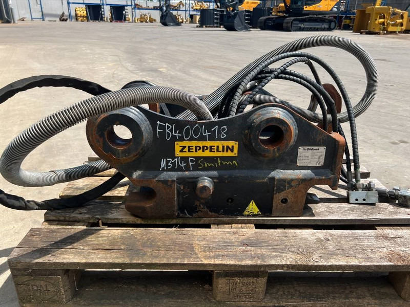 OilQuick OQ65 - M314F / M316F / M318F - Brza spojka za Građevinski strojevi: slika OilQuick OQ65 - M314F / M316F / M318F - Brza spojka za Građevinski strojevi OilQuick OQ65 - M314F / M316F / M318F - Brza spojka za Građevinski strojevi: slika OilQuick OQ65 - M314F / M316F / M318F - Brza spojka za Građevinski strojevi