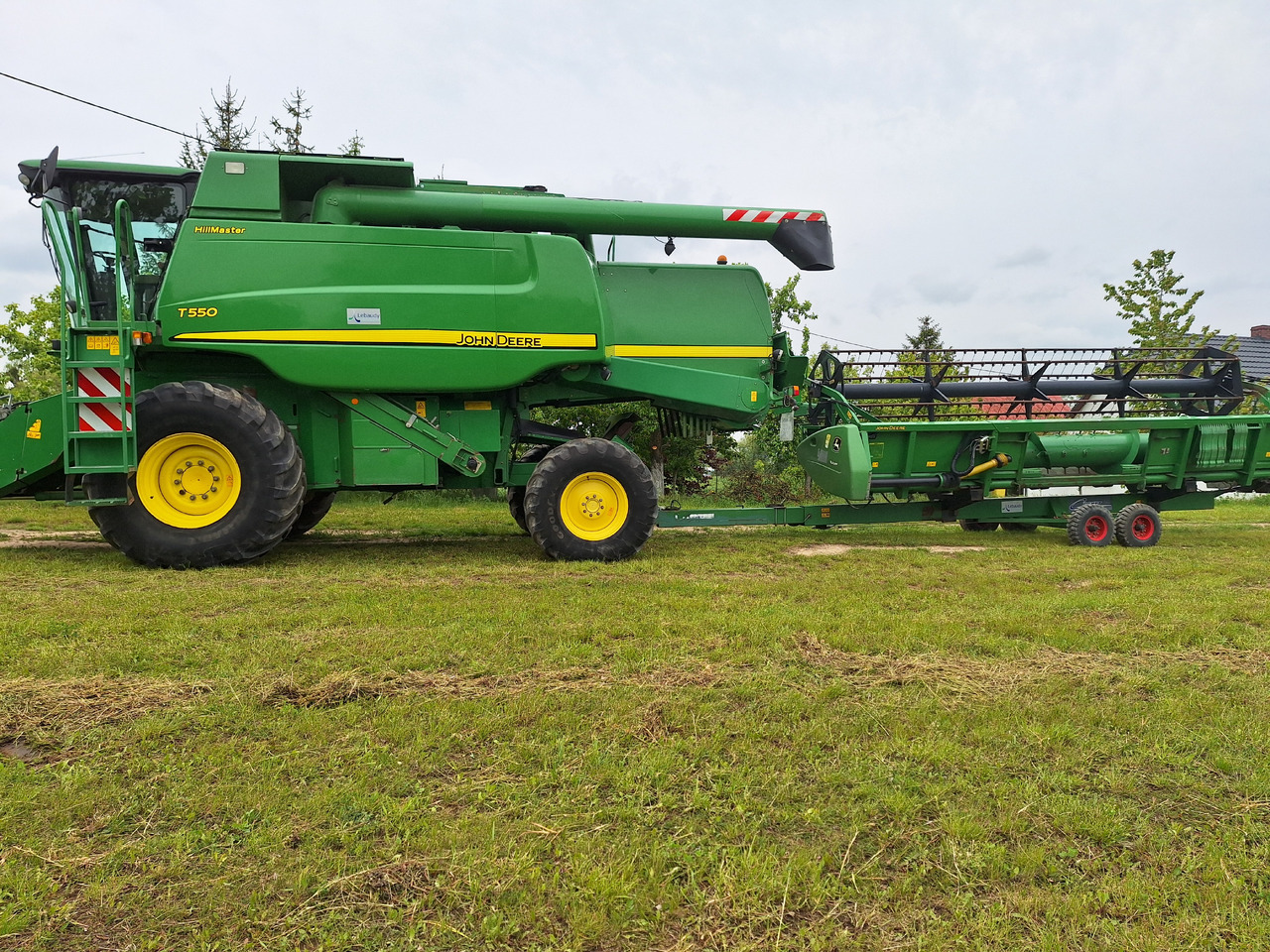 John Deere T550 - Kombajn za žetvu: slika John Deere T550 - Kombajn za žetvu John Deere T550 - Kombajn za žetvu: slika John Deere T550 - Kombajn za žetvu