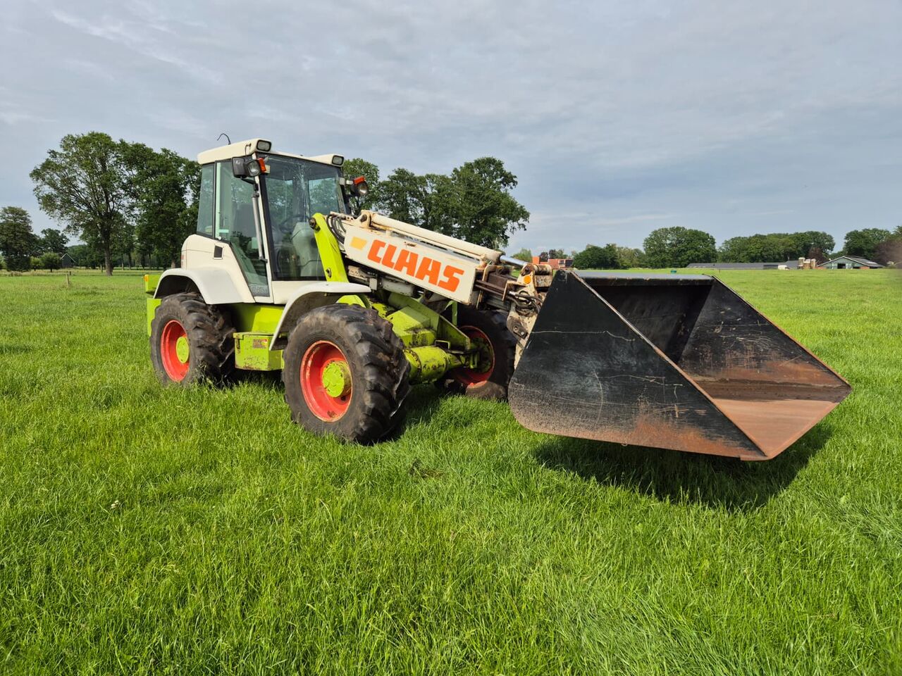 Claas Ranger 940 RX - Utovarivač na kotačima: slika Claas Ranger 940 RX - Utovarivač na kotačima Claas Ranger 940 RX - Utovarivač na kotačima: slika Claas Ranger 940 RX - Utovarivač na kotačima