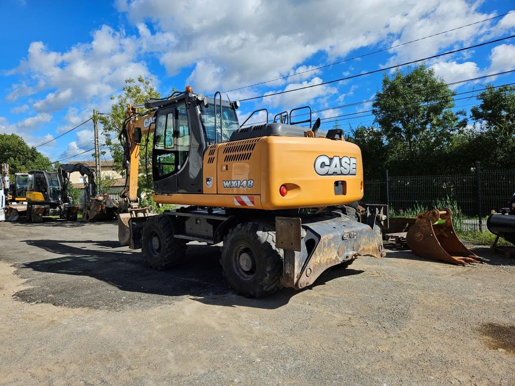 CASE WX 145 - Bager na kotačima: slika CASE WX 145 - Bager na kotačima CASE WX 145 - Bager na kotačima: slika CASE WX 145 - Bager na kotačima