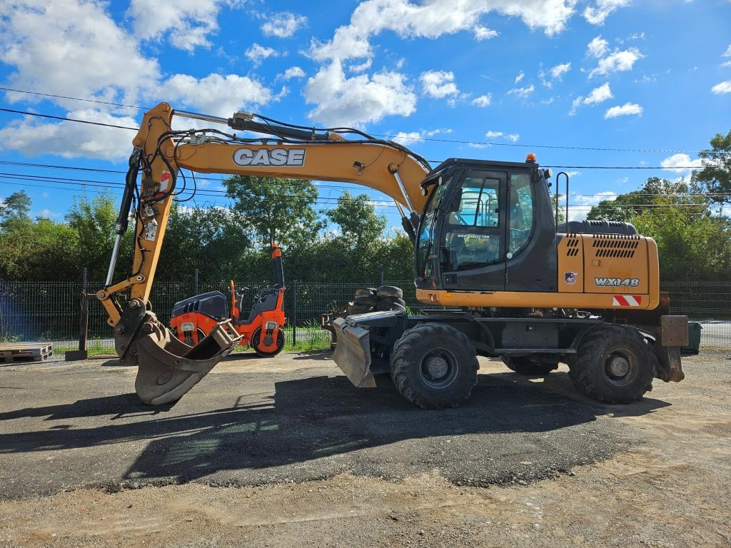 CASE WX 145 - Bager na kotačima: slika CASE WX 145 - Bager na kotačima CASE WX 145 - Bager na kotačima: slika CASE WX 145 - Bager na kotačima