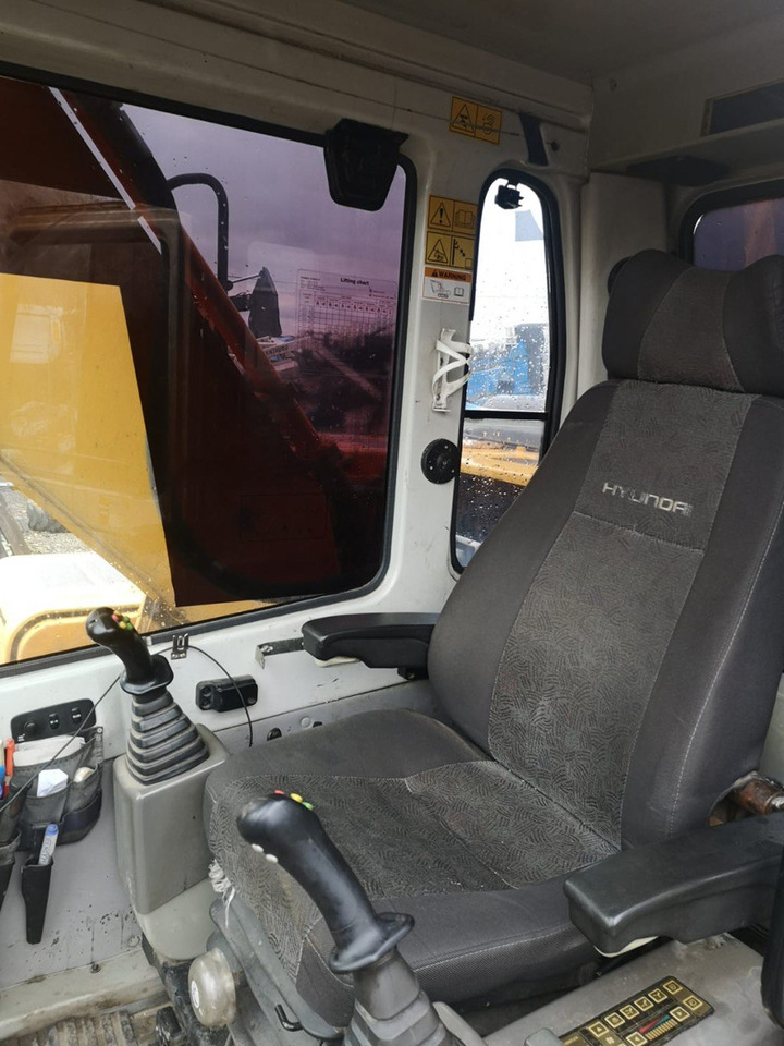 HYUNDAI 210 - Bager na kotačima: slika HYUNDAI 210 - Bager na kotačima HYUNDAI 210 - Bager na kotačima: slika HYUNDAI 210 - Bager na kotačima