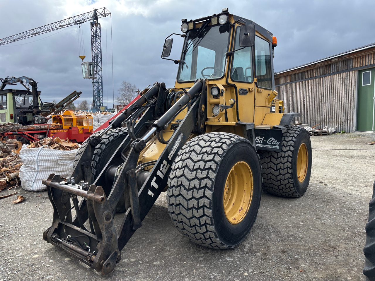 CAT IT12 Z - Utovarivač na kotačima: slika CAT IT12 Z - Utovarivač na kotačima CAT IT12 Z - Utovarivač na kotačima: slika CAT IT12 Z - Utovarivač na kotačima