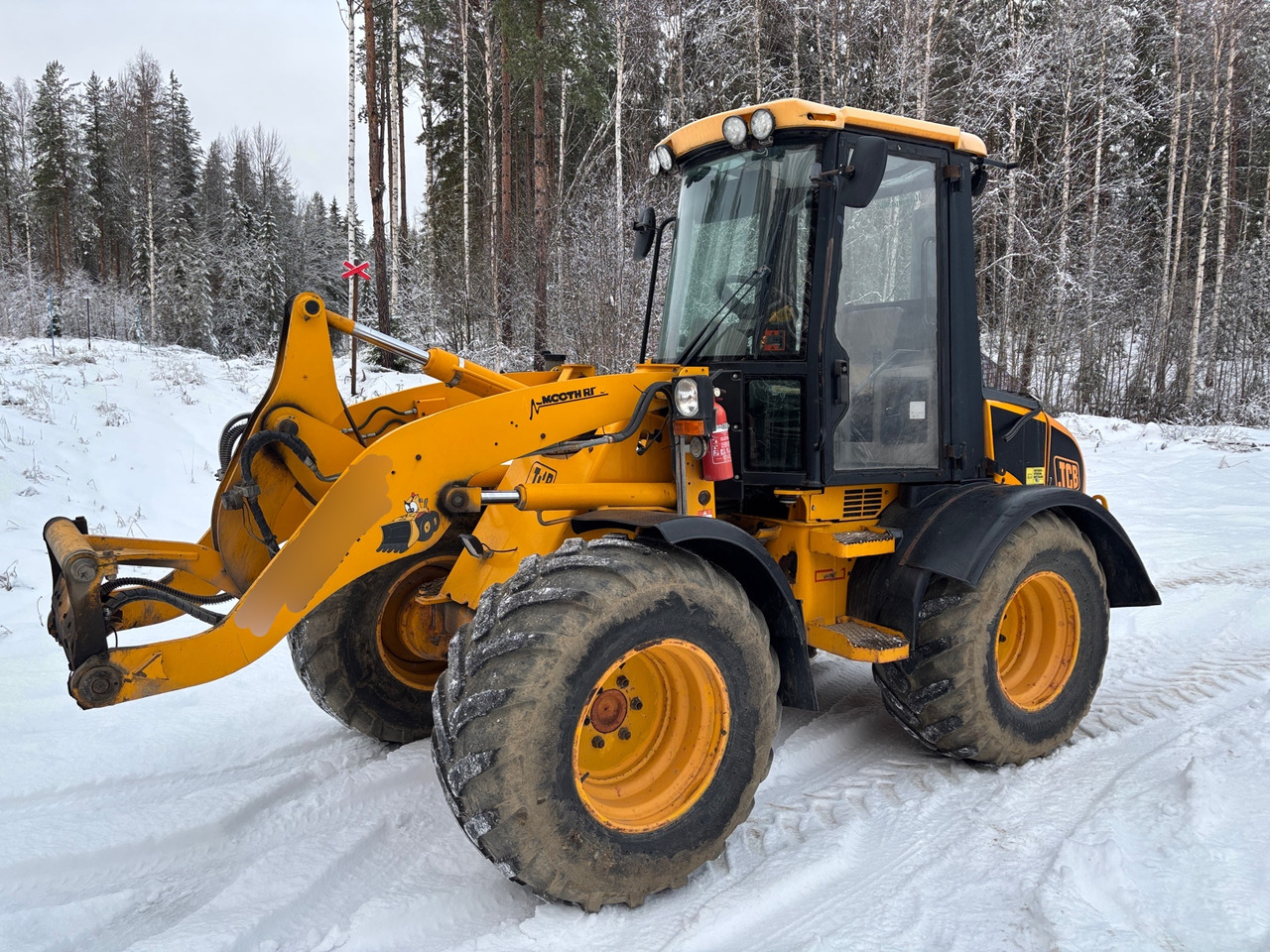 JCB 409 - Utovarivač na kotačima: slika JCB 409 - Utovarivač na kotačima JCB 409 - Utovarivač na kotačima: slika JCB 409 - Utovarivač na kotačima