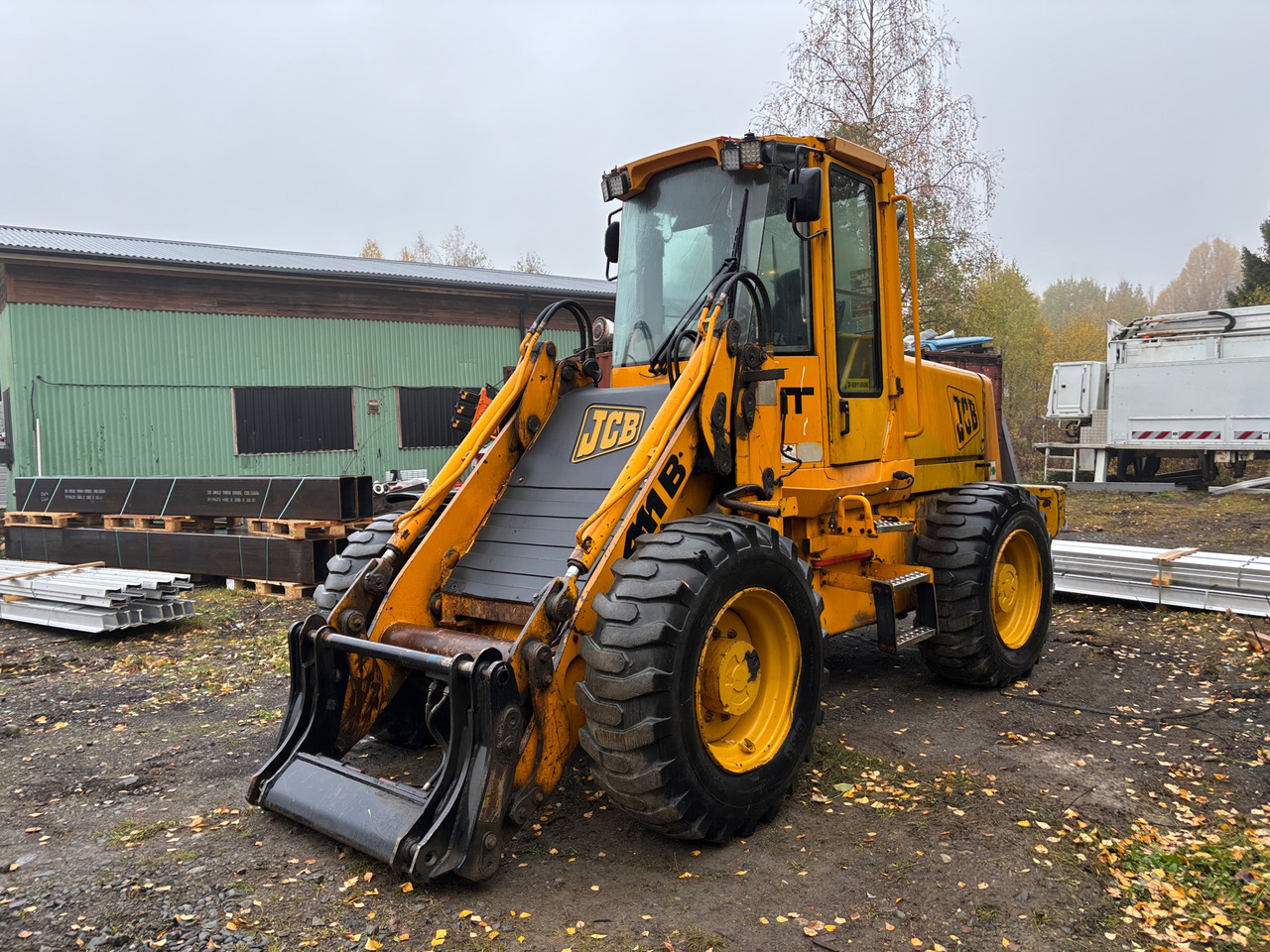 JCB 411B - Utovarivač na kotačima: slika JCB 411B - Utovarivač na kotačima JCB 411B - Utovarivač na kotačima: slika JCB 411B - Utovarivač na kotačima