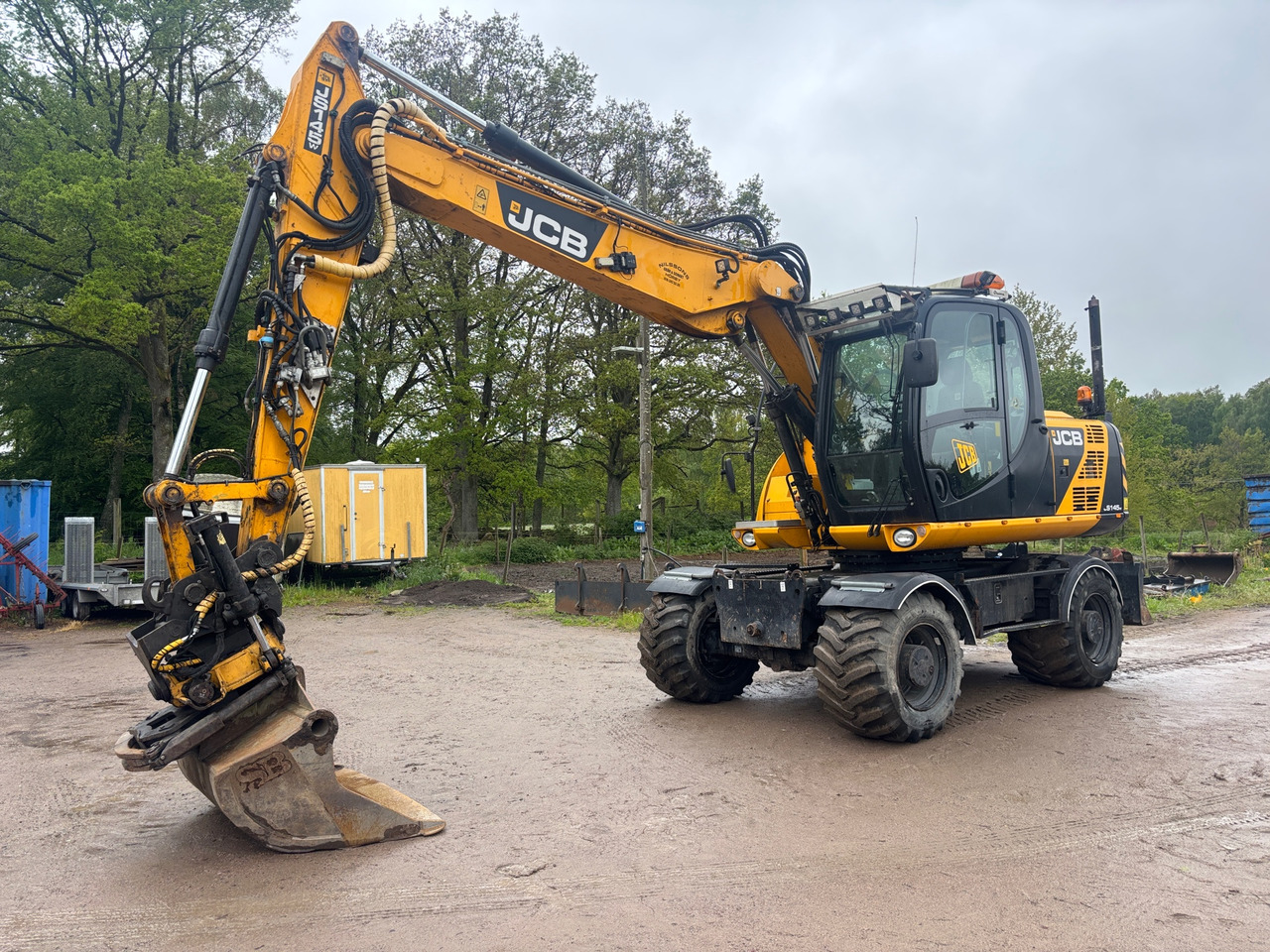 JCB JS145W - Bager: slika JCB JS145W - Bager JCB JS145W - Bager: slika JCB JS145W - Bager