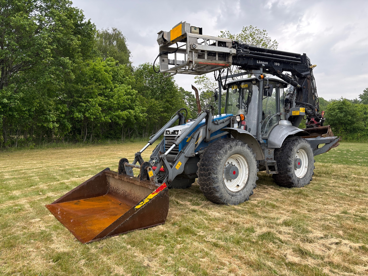 Lännen 8600 E - Rovokopač-utovarivač: slika Lännen 8600 E - Rovokopač-utovarivač Lännen 8600 E - Rovokopač-utovarivač: slika Lännen 8600 E - Rovokopač-utovarivač