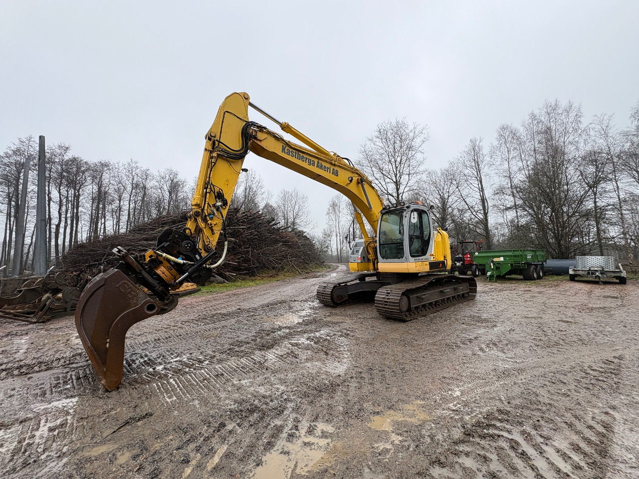 New Holland / Kobelco E 235 SR - Bager: slika New Holland / Kobelco E 235 SR - Bager New Holland / Kobelco E 235 SR - Bager: slika New Holland / Kobelco E 235 SR - Bager