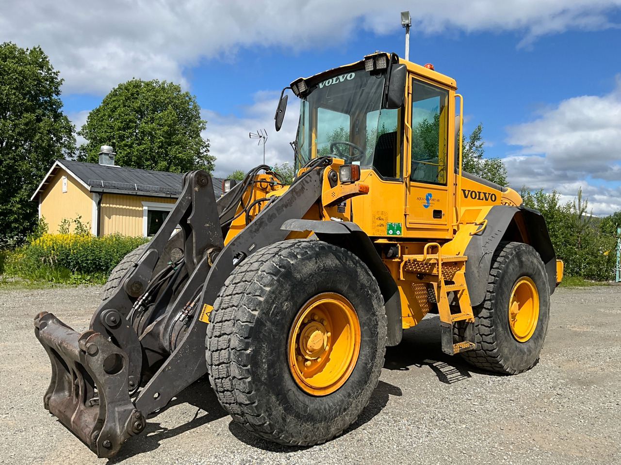 Volvo L60E - Utovarivač na kotačima: slika Volvo L60E - Utovarivač na kotačima Volvo L60E - Utovarivač na kotačima: slika Volvo L60E - Utovarivač na kotačima