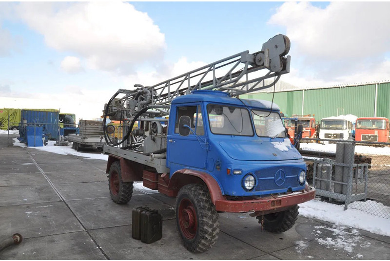 Unimog Mercedes S 404 boormachine Bomag - Platforma za bušenje: slika Unimog Mercedes S 404 boormachine Bomag - Platforma za bušenje Unimog Mercedes S 404 boormachine Bomag - Platforma za bušenje: slika Unimog Mercedes S 404 boormachine Bomag - Platforma za bušenje