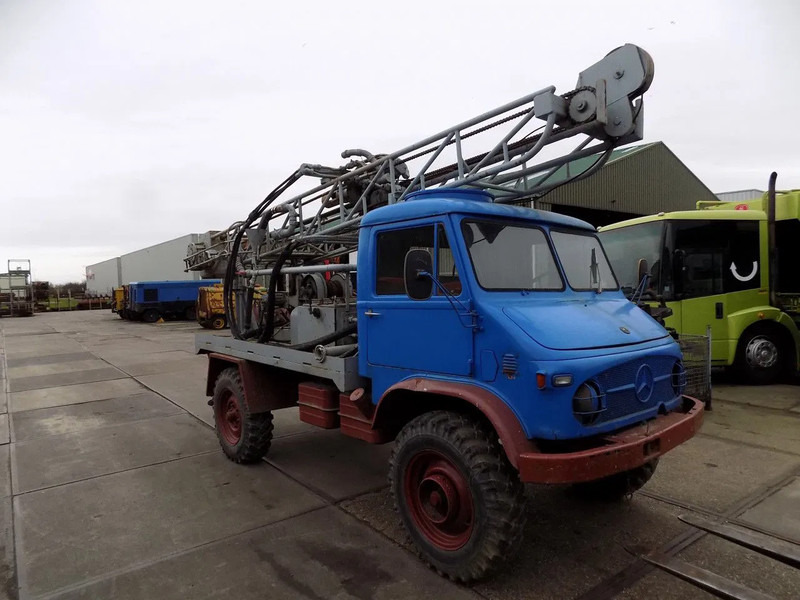 Unimog Mercedes S 404 boormachine Bomag - Platforma za bušenje: slika Unimog Mercedes S 404 boormachine Bomag - Platforma za bušenje Unimog Mercedes S 404 boormachine Bomag - Platforma za bušenje: slika Unimog Mercedes S 404 boormachine Bomag - Platforma za bušenje