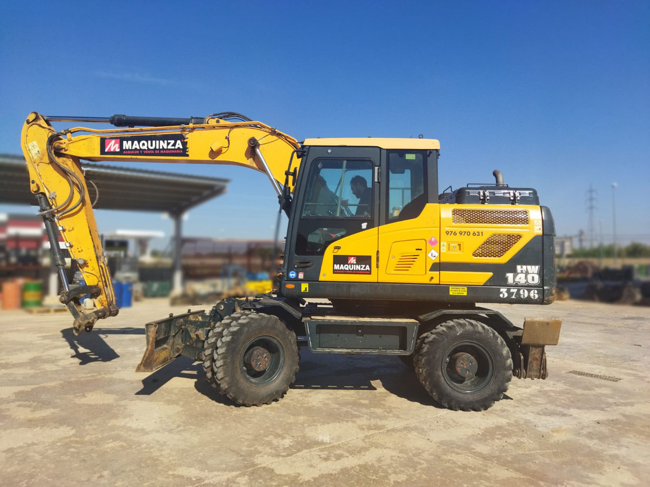 HYUNDAI HW140 - Bager na kotačima: slika HYUNDAI HW140 - Bager na kotačima HYUNDAI HW140 - Bager na kotačima: slika HYUNDAI HW140 - Bager na kotačima
