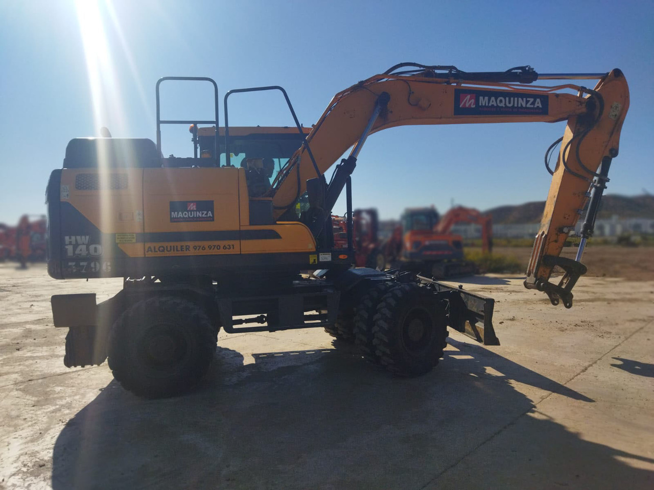 HYUNDAI HW140 - Bager na kotačima: slika HYUNDAI HW140 - Bager na kotačima HYUNDAI HW140 - Bager na kotačima: slika HYUNDAI HW140 - Bager na kotačima