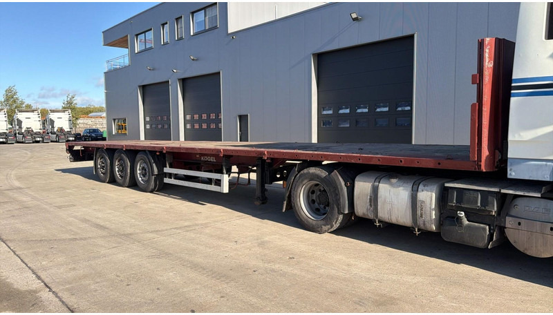 Kögel S 24 (BPW / DISC BRAKES / FREINS DISQUE) - Poluprikolica plato/ Otvoreni sanduk: slika Kögel S 24 (BPW / DISC BRAKES / FREINS DISQUE) - Poluprikolica plato/ Otvoreni sanduk Kögel S 24 (BPW / DISC BRAKES / FREINS DISQUE) - Poluprikolica plato/ Otvoreni sanduk: slika Kögel S 24 (BPW / DISC BRAKES / FREINS DISQUE) - Poluprikolica plato/ Otvoreni sanduk