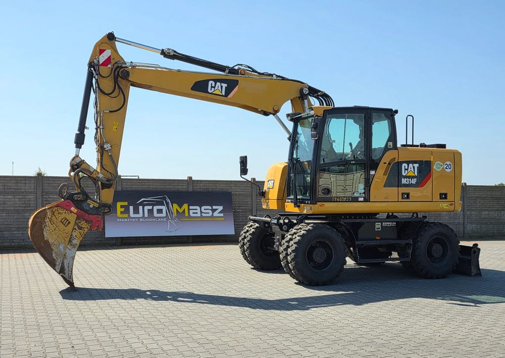 Caterpillar M314F, 2019 ROK, 3300 MTH, OIL QUICK OQ 65 - Bager na kotačima: slika Caterpillar M314F, 2019 ROK, 3300 MTH, OIL QUICK OQ 65 - Bager na kotačima Caterpillar M314F, 2019 ROK, 3300 MTH, OIL QUICK OQ 65 - Bager na kotačima: slika Caterpillar M314F, 2019 ROK, 3300 MTH, OIL QUICK OQ 65 - Bager na kotačima