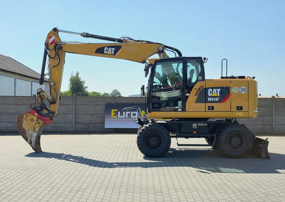 Caterpillar M314F, 2019 ROK, 3300 MTH, OIL QUICK OQ 65 - Bager na kotačima: slika Caterpillar M314F, 2019 ROK, 3300 MTH, OIL QUICK OQ 65 - Bager na kotačima Caterpillar M314F, 2019 ROK, 3300 MTH, OIL QUICK OQ 65 - Bager na kotačima: slika Caterpillar M314F, 2019 ROK, 3300 MTH, OIL QUICK OQ 65 - Bager na kotačima