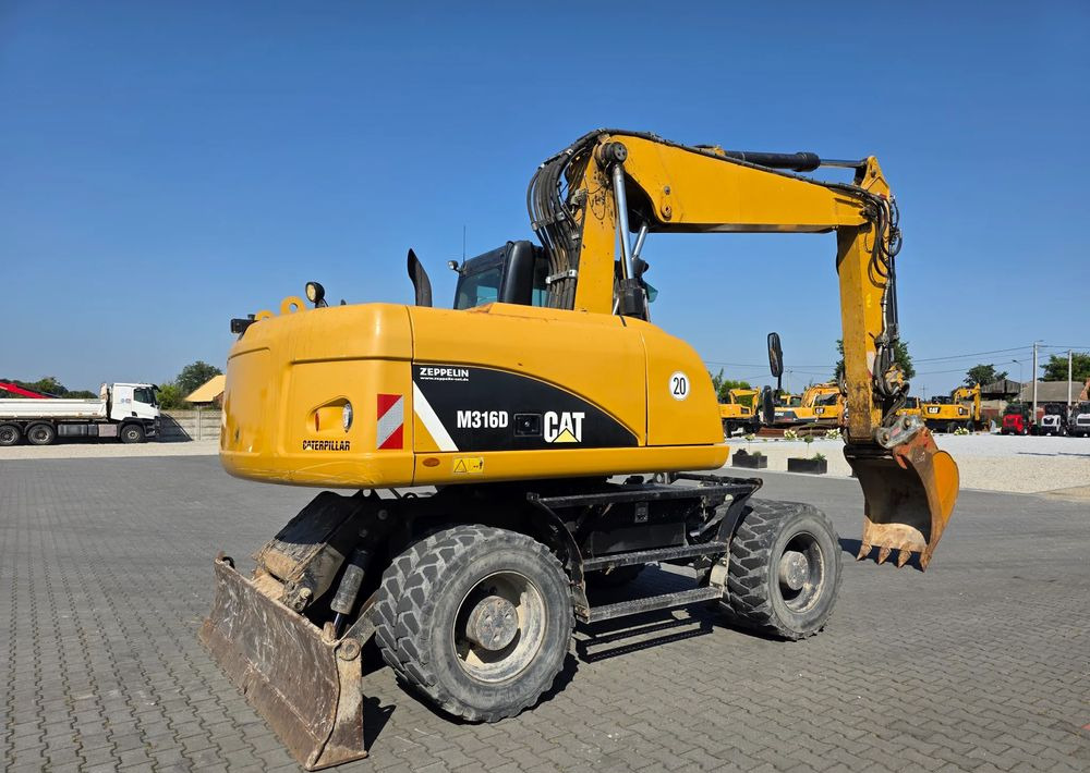 Caterpillar M316D, 2014 ROK, SZEROKIE MOSTY 275 CM, BEZ DPF i ADBLUE - Bager na kotačima: slika Caterpillar M316D, 2014 ROK, SZEROKIE MOSTY 275 CM, BEZ DPF i ADBLUE - Bager na kotačima Caterpillar M316D, 2014 ROK, SZEROKIE MOSTY 275 CM, BEZ DPF i ADBLUE - Bager na kotačima: slika Caterpillar M316D, 2014 ROK, SZEROKIE MOSTY 275 CM, BEZ DPF i ADBLUE - Bager na kotačima